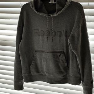 Thick grey cozy sweatshirt with hood.